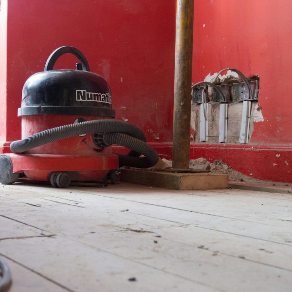 black and red vacuum cleaner